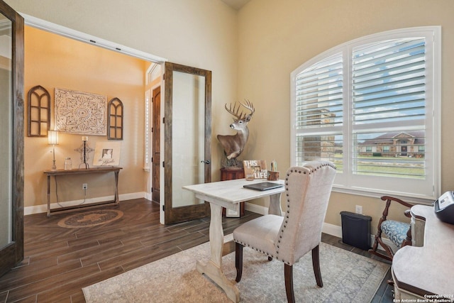 dining room with dark hardwood / wood-style floors