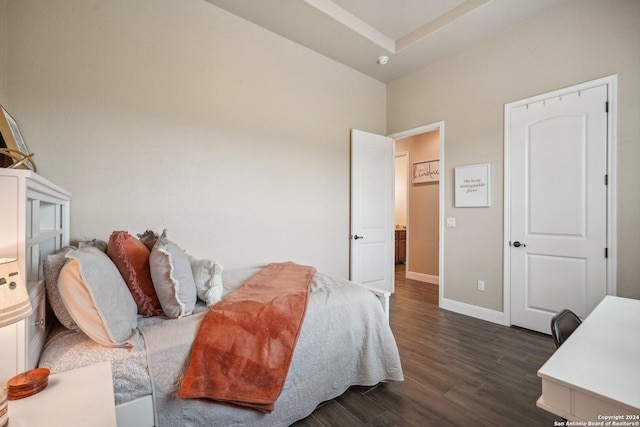 bedroom featuring dark hardwood / wood-style floors