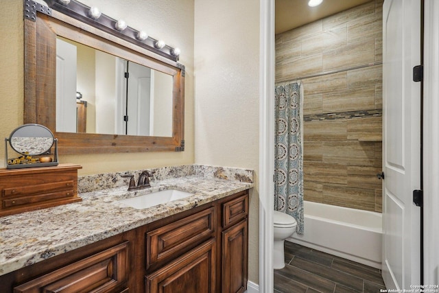 full bathroom with vanity, toilet, and shower / bathtub combination with curtain