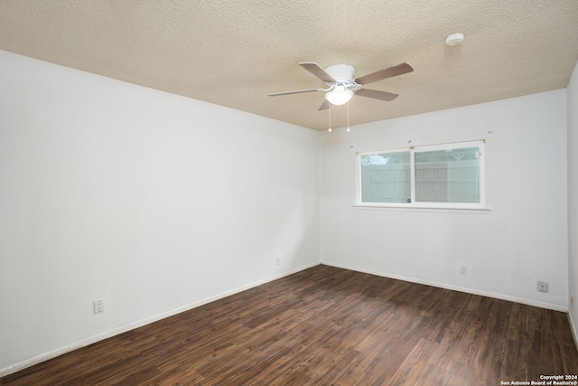 unfurnished room featuring a textured ceiling, ceiling fan, and dark wood-type flooring