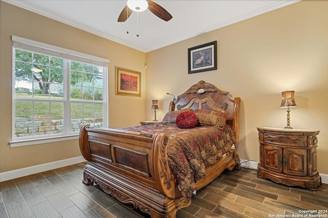 bedroom with ceiling fan, dark hardwood / wood-style flooring, and ornamental molding