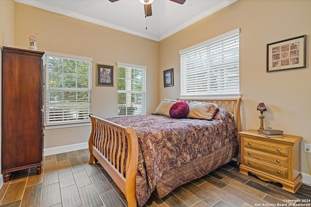 bedroom with ceiling fan and ornamental molding