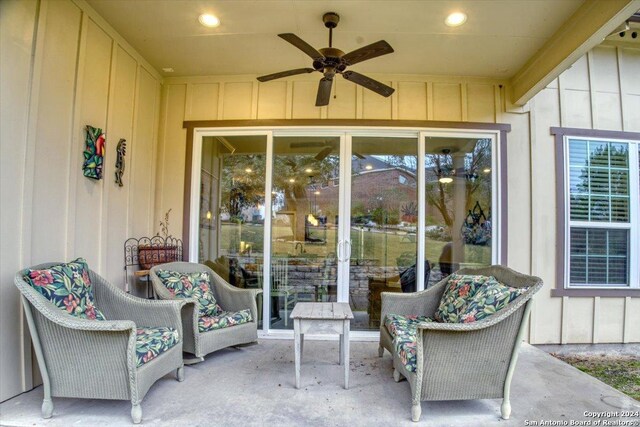 view of patio featuring ceiling fan