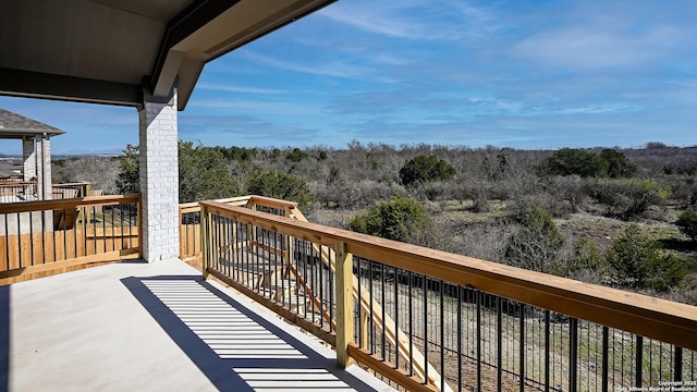 balcony with a wooded view