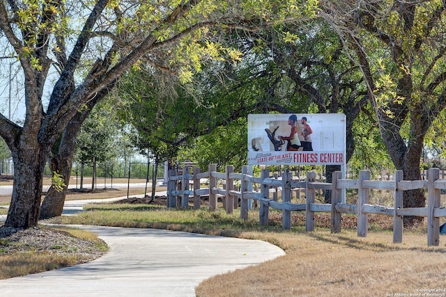 surrounding community featuring fence