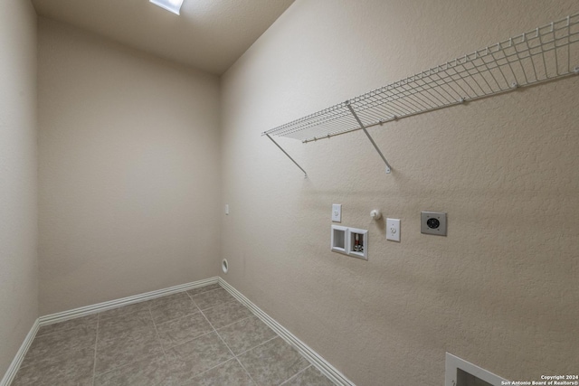 washroom featuring tile patterned flooring, washer hookup, gas dryer hookup, and electric dryer hookup