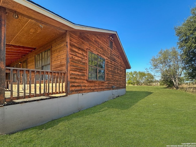 view of home's exterior featuring a lawn