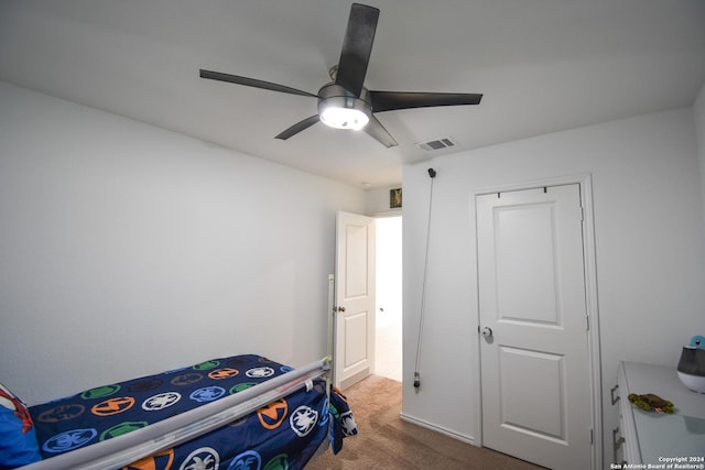 bedroom featuring ceiling fan and carpet floors