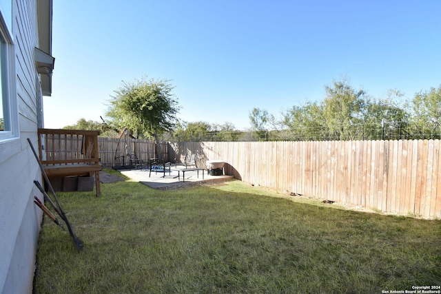 view of yard with a patio area