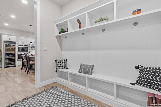 mudroom with beverage cooler