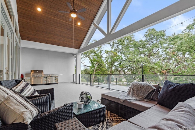 view of patio / terrace featuring an outdoor kitchen and ceiling fan