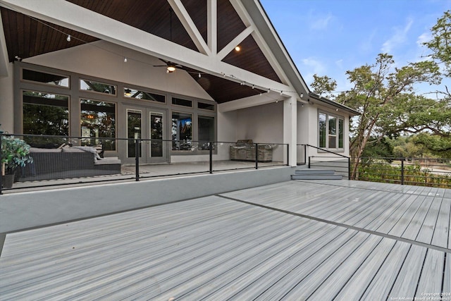 wooden terrace featuring ceiling fan