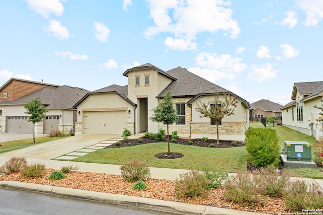 view of front of home featuring a garage and a front yard