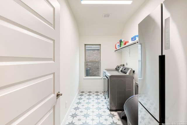 laundry room featuring independent washer and dryer