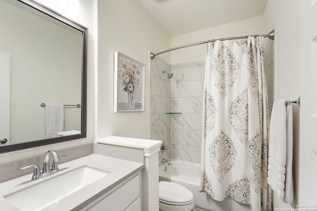 full bathroom with shower / tub combo with curtain, vanity, and toilet