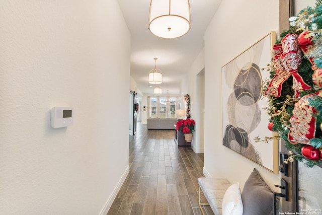 corridor with dark wood-type flooring