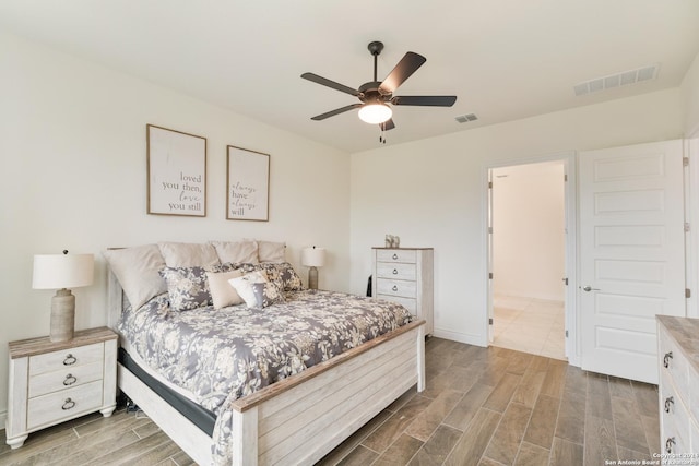 bedroom featuring ceiling fan and hardwood / wood-style floors