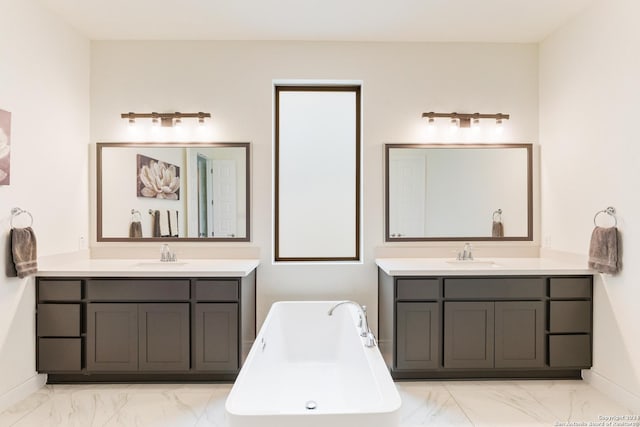 bathroom featuring a bathtub and vanity