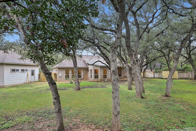 view of front of home with a front yard