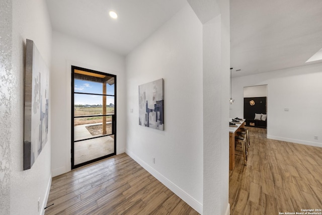 hall featuring light hardwood / wood-style floors