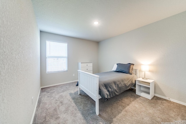 bedroom featuring carpet flooring