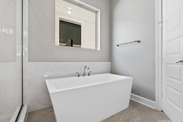 bathroom featuring a bathtub