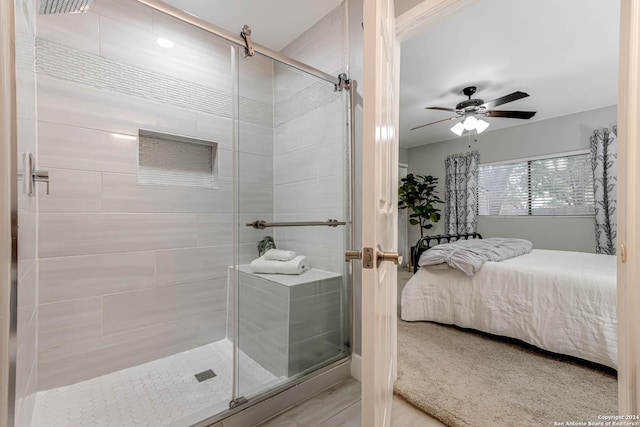 bathroom with ceiling fan and walk in shower