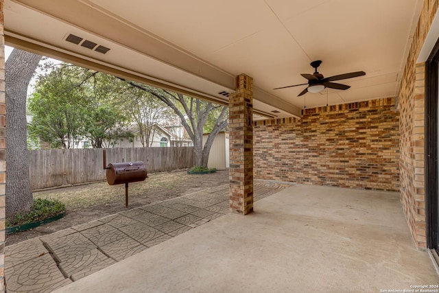 view of patio featuring ceiling fan