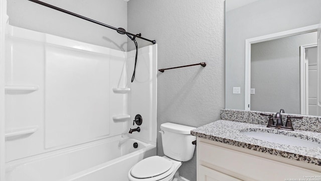 full bathroom featuring vanity, shower / bath combination, and toilet