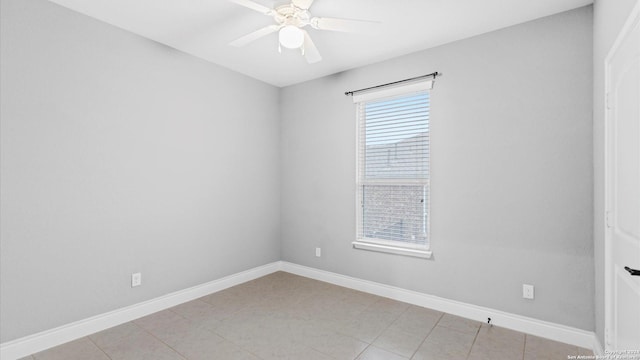 unfurnished room featuring light tile patterned floors and ceiling fan