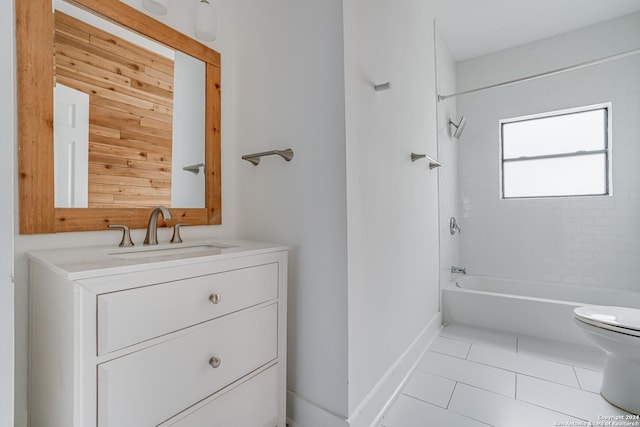 full bathroom with tile patterned floors, vanity, toilet, and tiled shower / bath combo