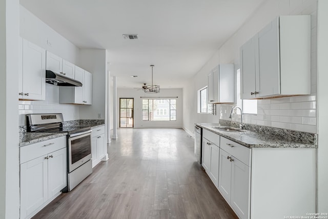 kitchen featuring sink, ceiling fan, light wood-type flooring, white cabinetry, and stainless steel appliances