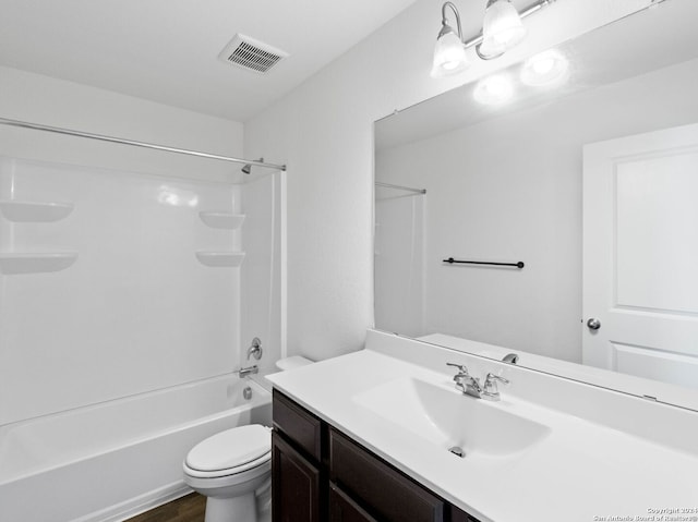 full bathroom featuring vanity,  shower combination, toilet, and wood-type flooring