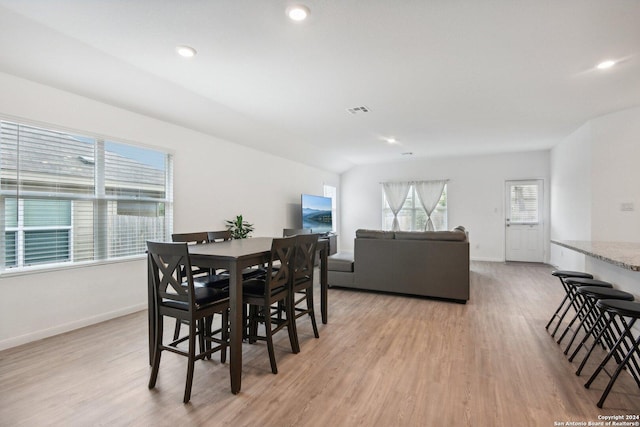 dining area featuring light wood-type flooring