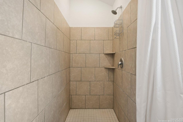 bathroom featuring tile patterned floors and walk in shower