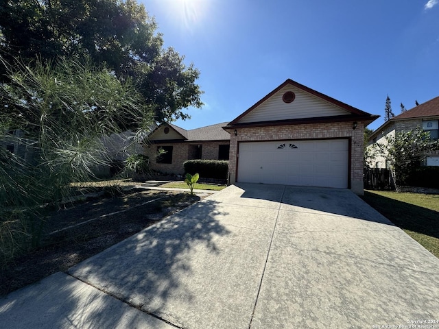 ranch-style house with a garage