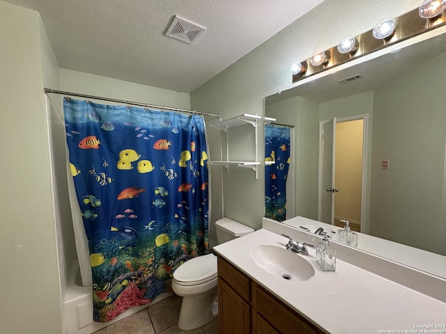 full bathroom with vanity, tile patterned flooring, toilet, a textured ceiling, and shower / tub combo with curtain