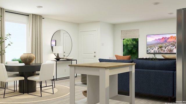 dining room with light wood-type flooring