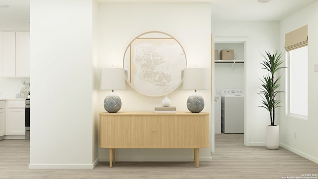 interior space featuring hardwood / wood-style floors and washer / dryer