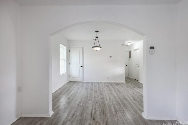 unfurnished room featuring light hardwood / wood-style floors