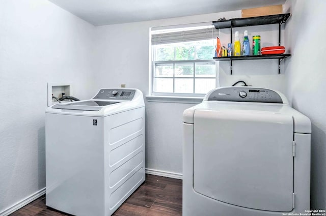 washroom featuring washer and clothes dryer and dark hardwood / wood-style floors