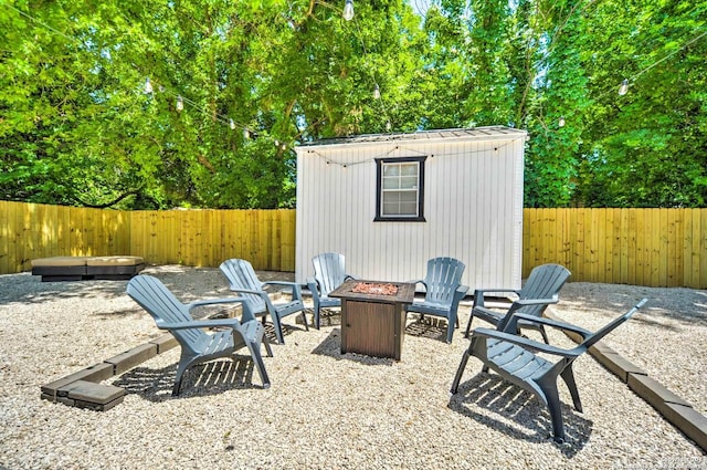 view of patio / terrace featuring a fire pit