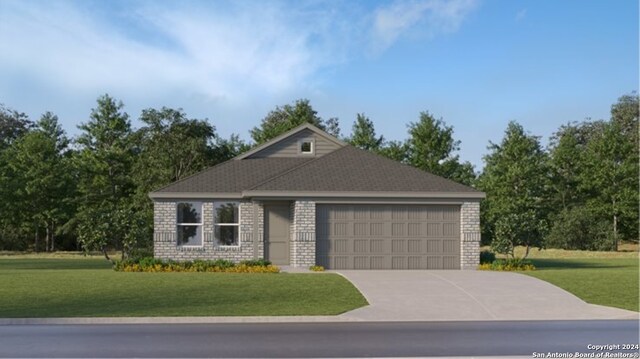 view of front of home with a garage and a front lawn