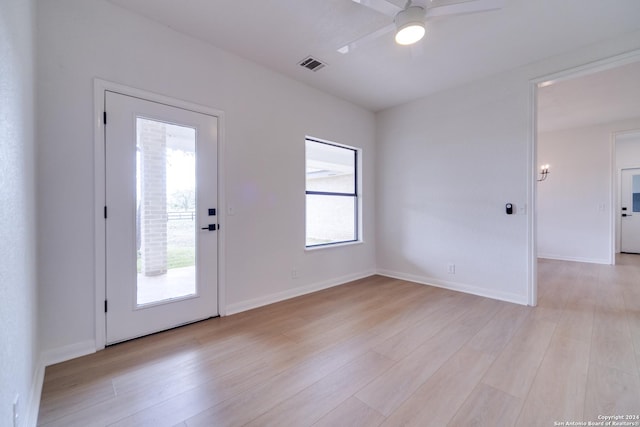 interior space featuring ceiling fan and light wood-type flooring