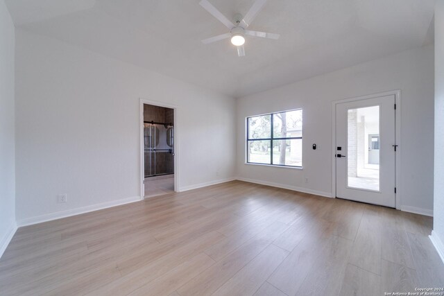 unfurnished room featuring ceiling fan and light hardwood / wood-style flooring