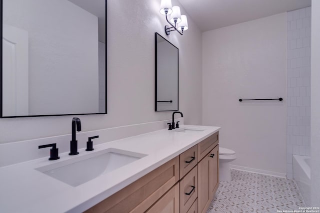 full bathroom with vanity, toilet,  shower combination, and a notable chandelier