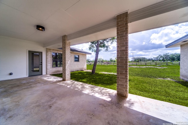 view of patio with a rural view