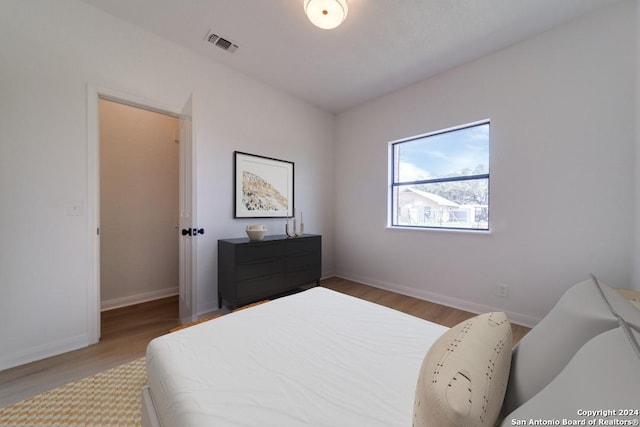 bedroom featuring hardwood / wood-style floors