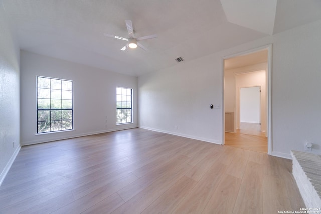 unfurnished room with light hardwood / wood-style flooring and ceiling fan