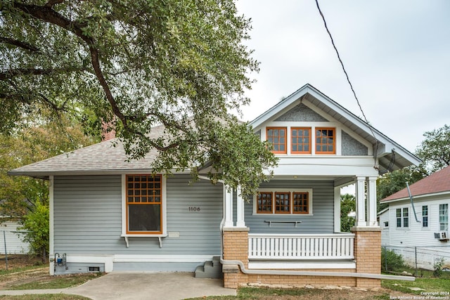 view of front of property featuring covered porch